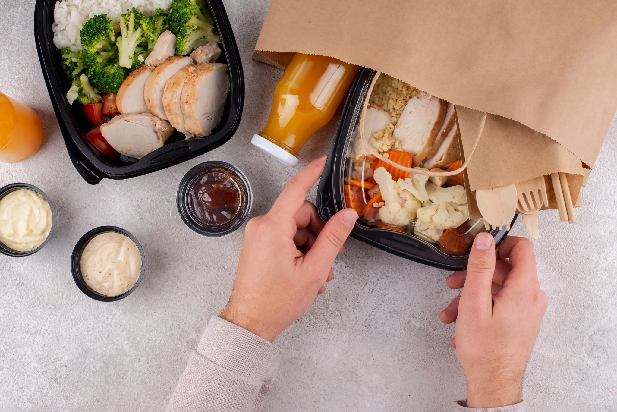 Fresh, healthy Kealthy bowls and ingredients on a bright counter